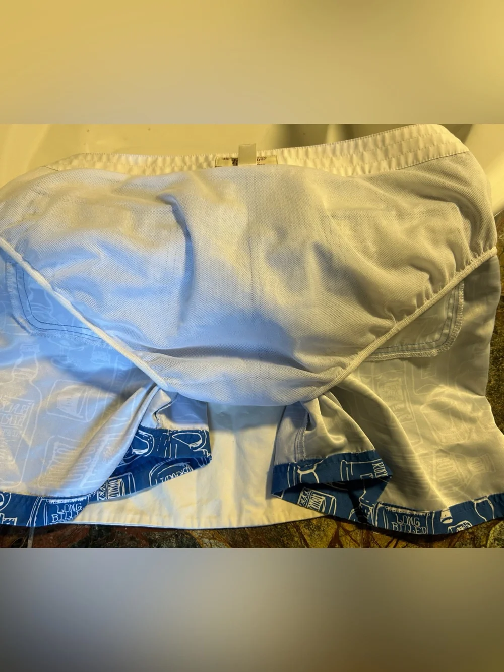 Penguin blue men’s swim trunk alcohol bottles, size 34